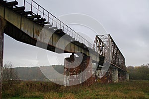 Old steel riveted and forgotten bridge