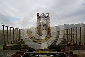 Old steel riveted and forgotten bridge