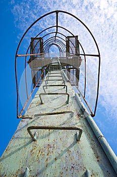 Old steel stair steps to the top of tower