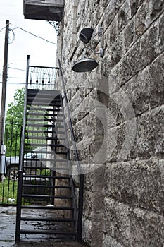 Stone wall and steel stairs in Bandera Texas photo