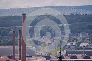 The old steelworks and houses in Ostrowiec and the church and houses in the neighboring town - Szewna.