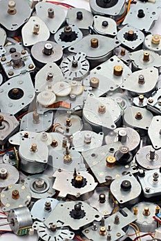 Old stepper motors as industrial e-waste background