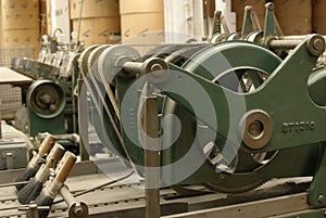 Old stitching machine, side view photo