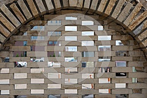 old stone arch/window with brickwork inside outdoor
