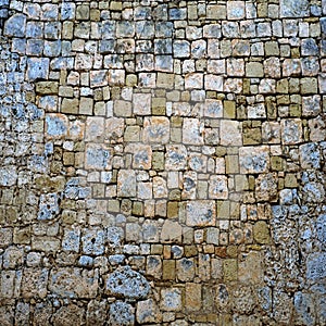 Old stone brick wall green and blue