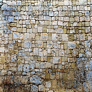 Old stone brick wall green and blue