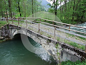 The old stone bridge across the Thur River in Unterwasser photo