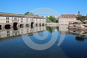 old stone bridge (barrage vauban), commandery saint-jean and ill river - strasbourg - france