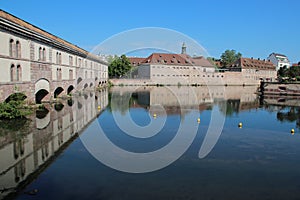 old stone bridge (barrage vauban), commandery saint-jean and ill river - strasbourg - france