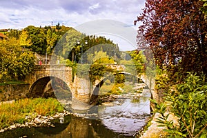 Old stone bridge in early winter photo