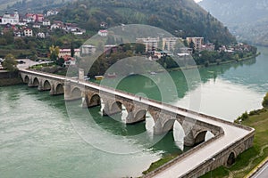 The old stone bridge of Mehmed Pasha Sokolovic over the river Drina in Visegrad