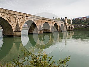 The old stone bridge of Mehmed Pasha Sokolovic over the river Drina in Visegrad