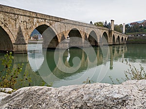 The old stone bridge of Mehmed Pasha Sokolovic over the river Drina in Visegrad