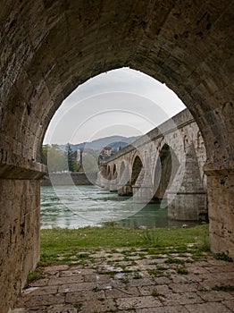 The old stone bridge of Mehmed Pasha Sokolovic over the river Drina in Visegrad