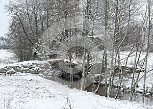 Ancient stone bridge over creek