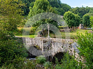 Old stone bridge on the Way of St. James in Central France