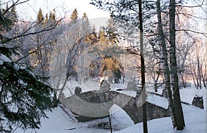Old stone bridge in winter park