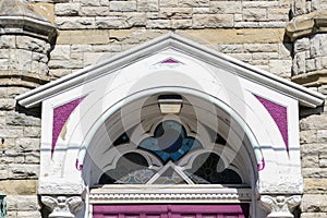 Pediment and stained glass transom window photo