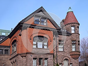 Old stone building with turret with conical roof