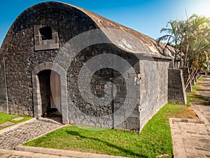 Beautiful old stone church in colonial architecture style on torpical island photo