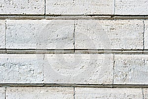 Old stone cladding plates on the wall closeup