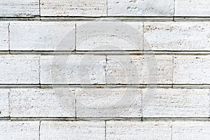 Old stone cladding plates on the wall closeup