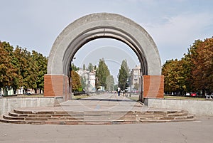 Old stone entrance arch in park