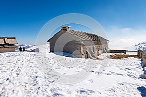 Old Stone Farmhouse and Cow Shed on Lessinia Plateau in Winter with Snow - Italy