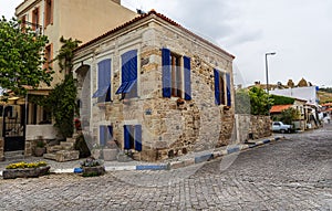 Old stone house with blue windows