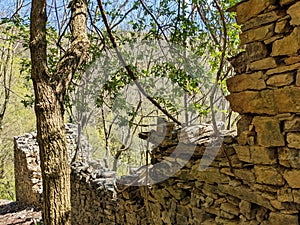 old stone houses in ticino. Derelict stone huts near the Monte Generoso mountain in Lugano. Nice hiking area.Spring time