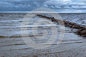 Old stone mole in Parnu bay.