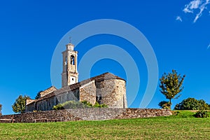 Old parish church under blue sky.