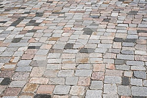 Old stone pavement - mixed cobblestone background