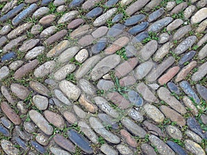 Old stone pavement road on the medieval street