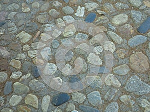 Old stone pavement road on the medieval street