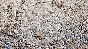 Old stone porous wall background