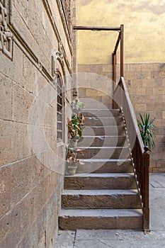 Old stone stair case with wooden balustrade, Old Cairo, Egypt photo