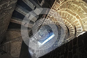 A old stone staircase in church tower leading down