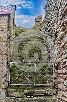 An old stone staircase leading to the sky