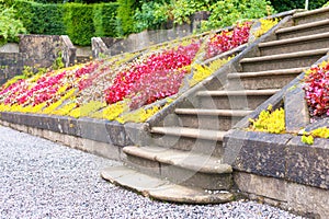 Old stone stairs in Glasgow country Pollok Park blossoming garden photo