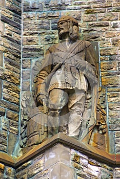 Old Stone Statue of a Frontiersman