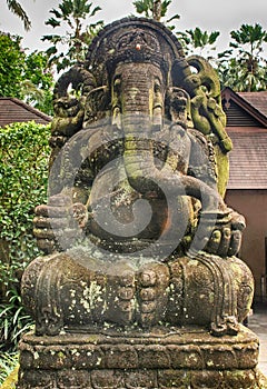 Old stone statue of Ganesha, a hindu symbol Indonesia.