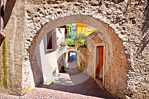 Old stone street of Limone sul Garda view