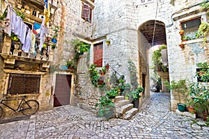 Old stone street of Trogir photo
