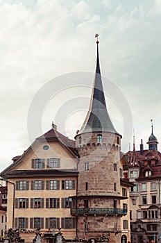 Old stone tower house in Lucern Switzerland overcast day old city center