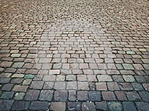 Old stone vintage pavement texture. Granite cobblestoned photo