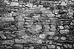 Old stone wall. Black and white image