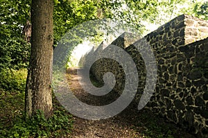 Old stone wall bordering the park