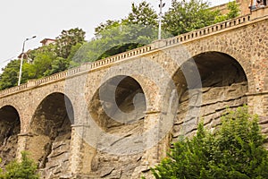 Old stone wall of the bridge