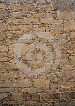 Old stone wall ideal for backgrounds and textures